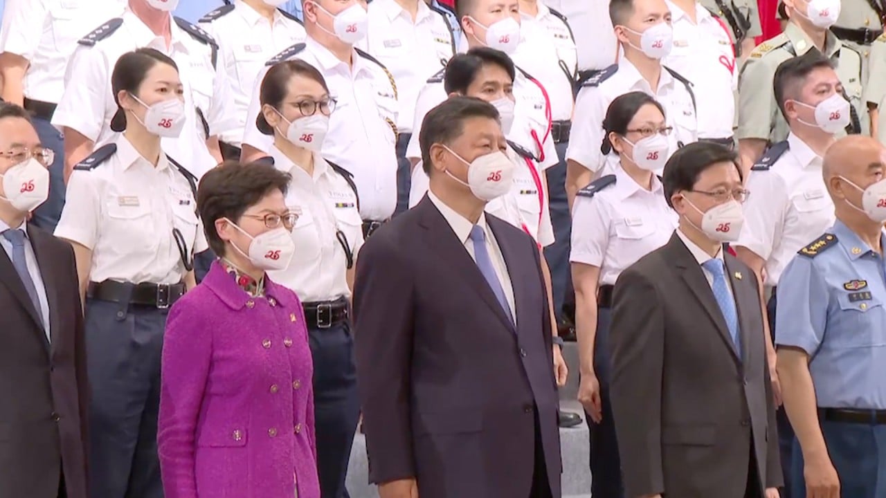 Chinese leader Xi Jinping greeted by Carrie Lam and disciplined services in Hong Kong